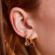 April: White Topaz Charms on Twisted Hoops