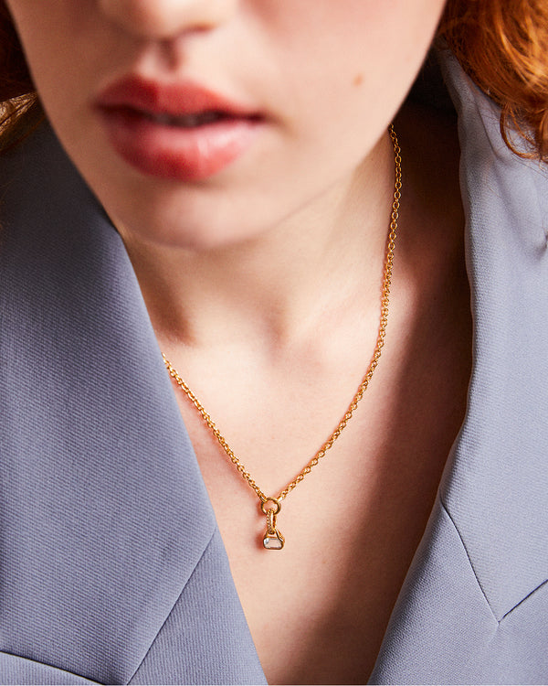 April: White Topaz Charm