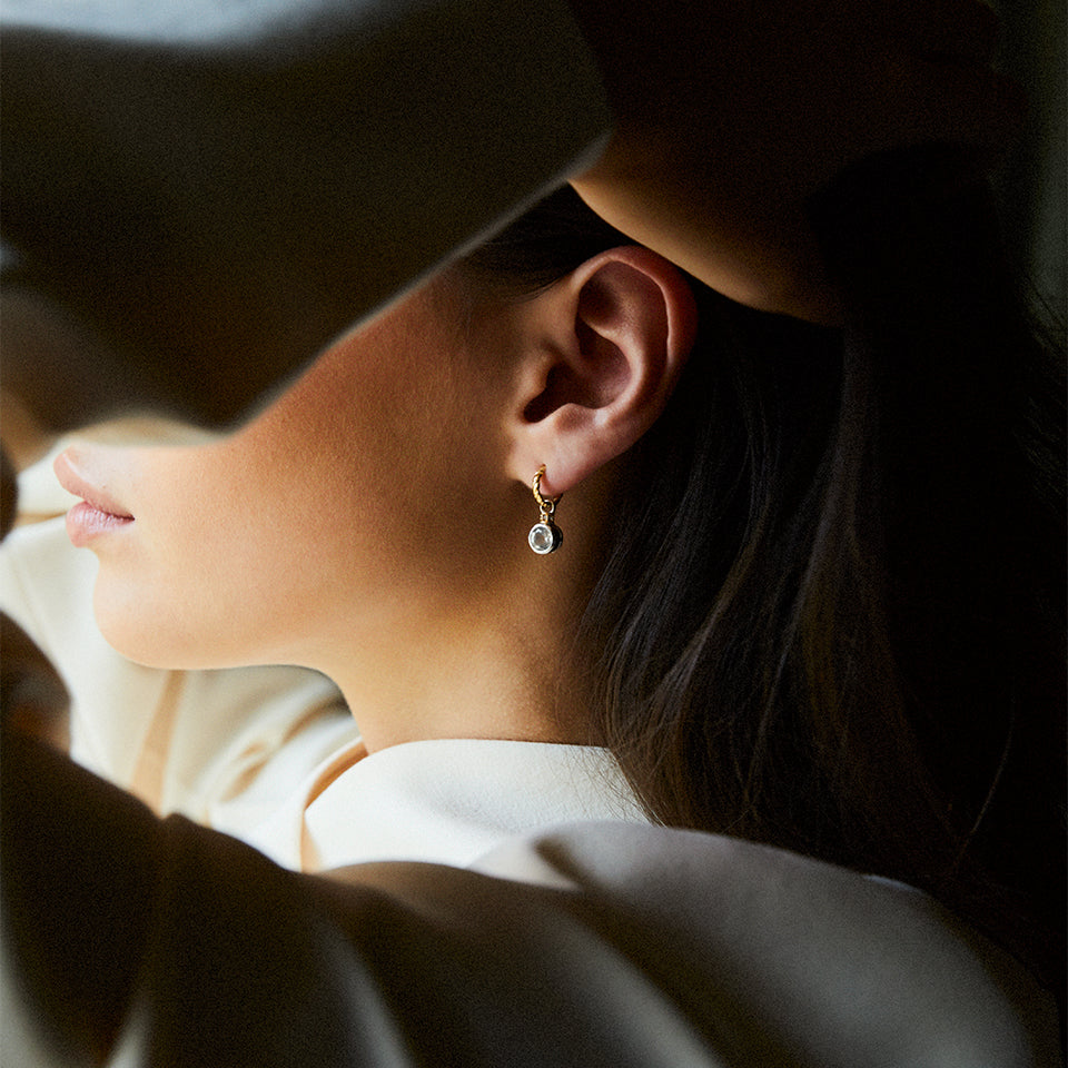 Brilliant Cut Charms on Twisted Hoops