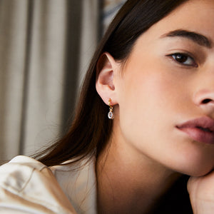 Oval Cut Charms on Twisted Hoops