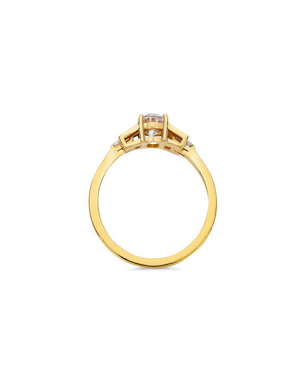 Oval cut diamond buckle ring in yellow gold