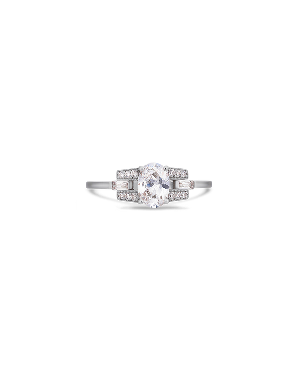Oval cut diamond buckle ring in platinum