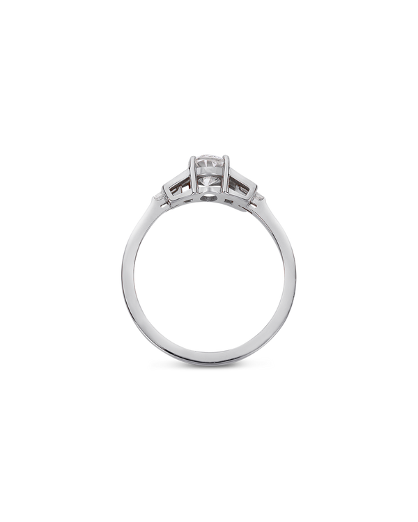 Oval cut diamond buckle ring in platinum