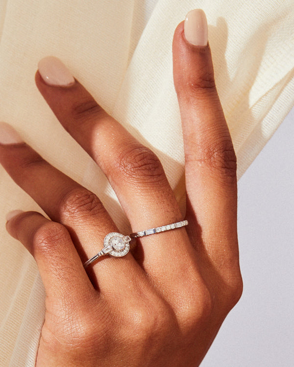 Round Art Deco halo diamond ring in yellow gold