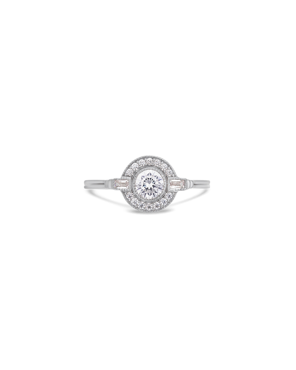 Round Art Deco diamond halo ring in white gold