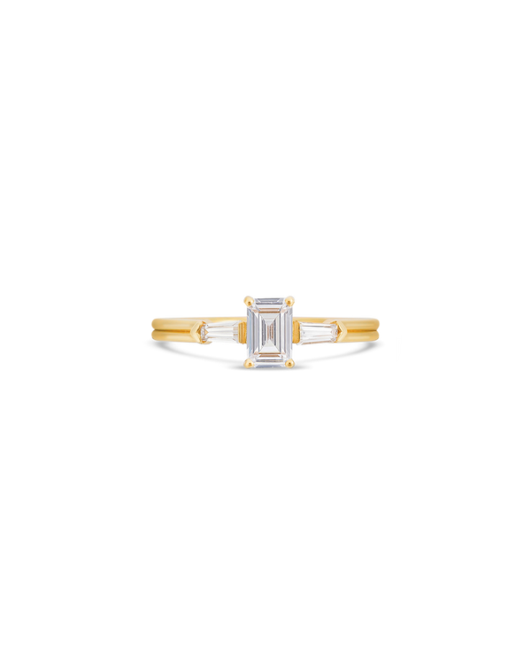 Illusion bullet & emerald cut diamond ring in yellow gold