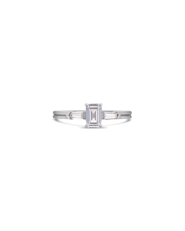 Illusion bullet & emerald cut diamond ring in platinum