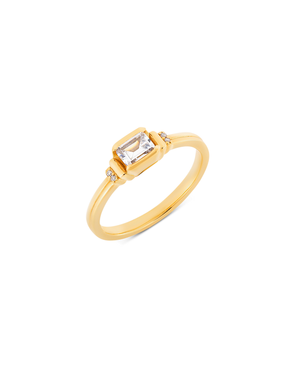Deco emerald cut solitaire diamond ring in yellow gold