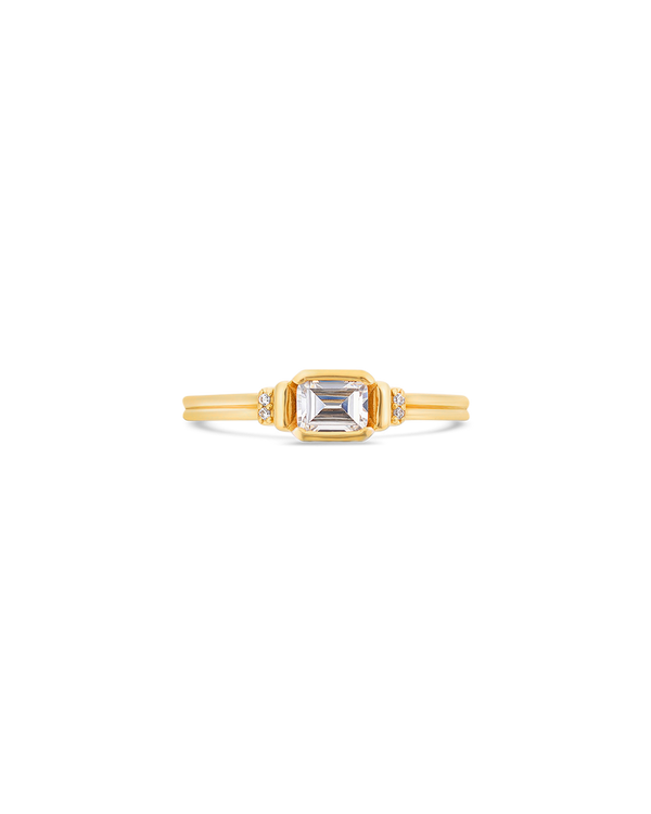 Deco emerald cut solitaire diamond ring in yellow gold