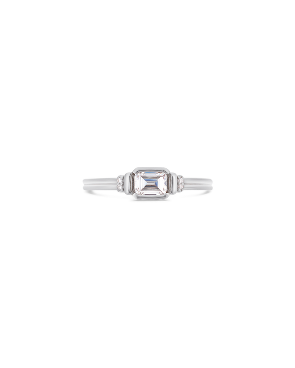 Deco emerald cut solitaire diamond ring in platinum
