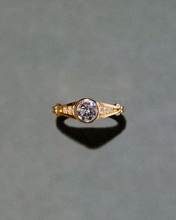 Bezel Set Brilliant Cut Ring with Double Ridged Band