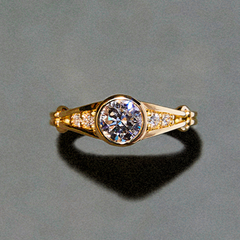 Bezel Set Brilliant Cut Ring with Double Ridged Band