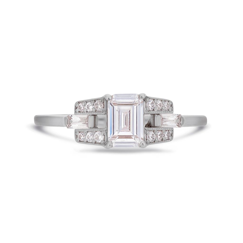 Emerald cut diamond buckle ring in platinum