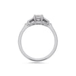 Emerald cut diamond buckle ring in platinum