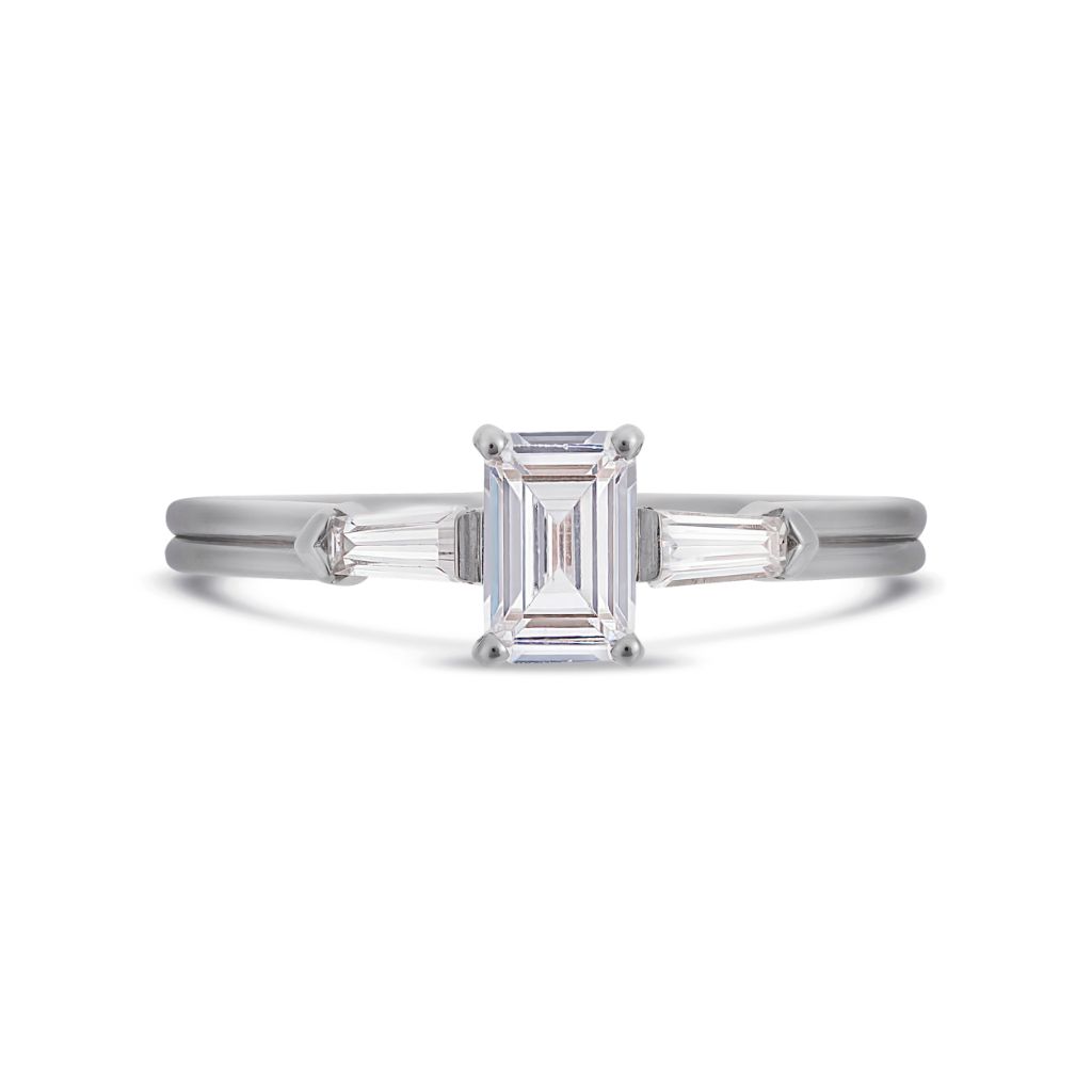 Illusion bullet & emerald cut diamond ring in platinum