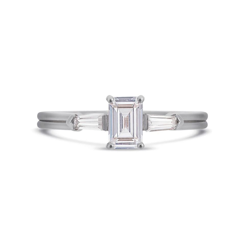 Illusion bullet & emerald cut diamond ring in platinum