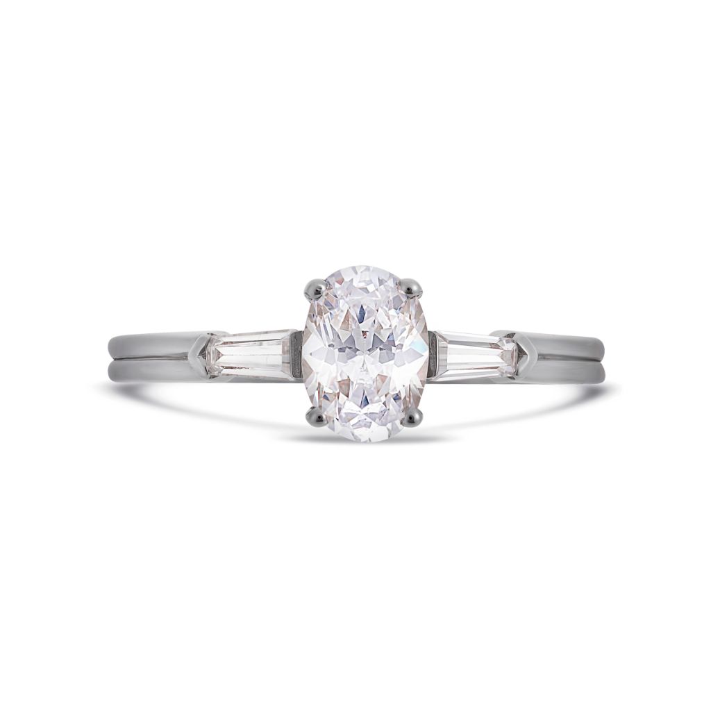 Illusion bullet & oval cut diamond ring in platinum