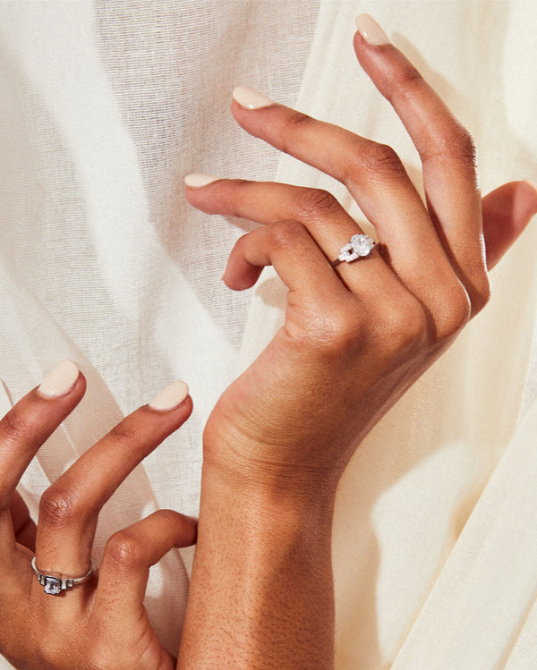 Oval cut buckle ring in platinum engagement ring v by laura vann