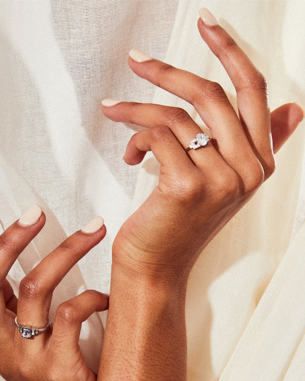 Oval cut buckle ring in white gold engagement ring v by laura vann