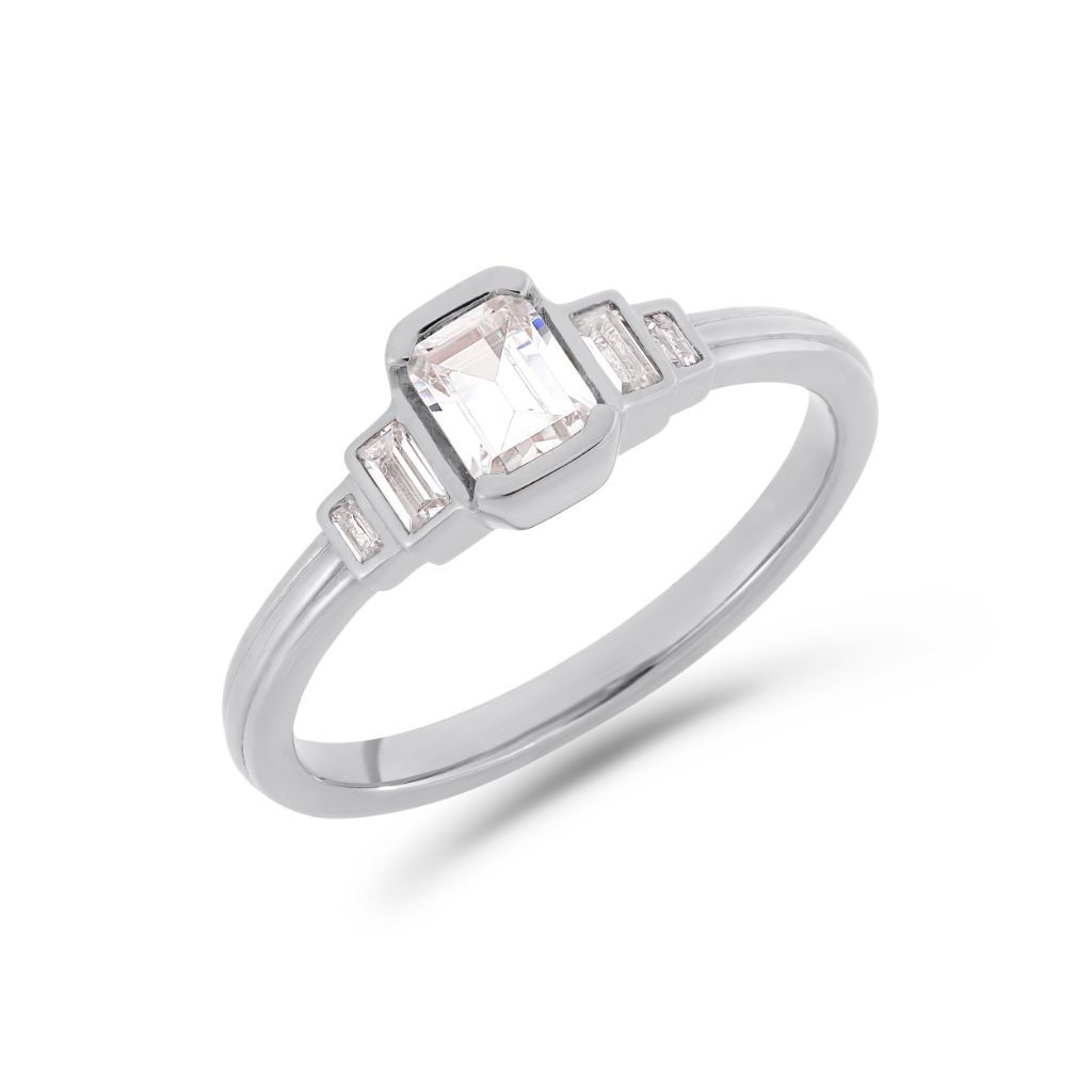 Deco cascading emerald & baguette cut diamond ring in platinum