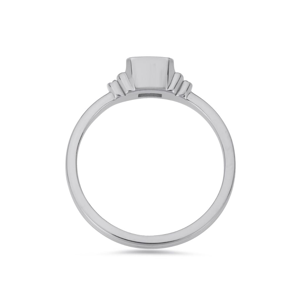 Deco emerald cut solitaire diamond ring in white gold