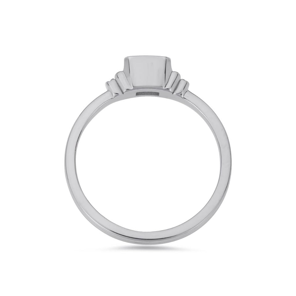 Deco emerald cut solitaire diamond ring in platinum
