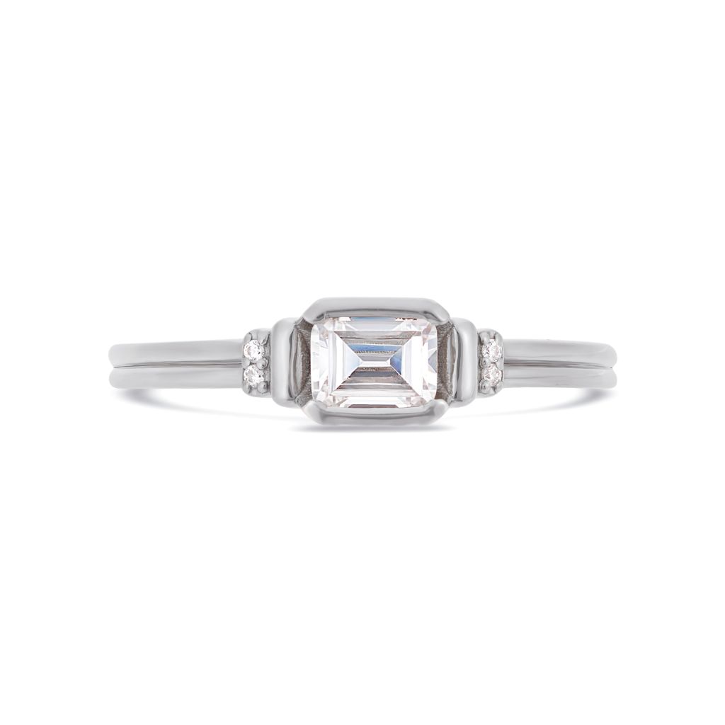 Deco emerald cut solitaire diamond ring in platinum