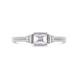 Deco emerald cut solitaire diamond ring in platinum