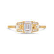Emerald cut diamond buckle ring in yellow gold